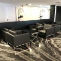 Audi Showroom | Product Seen: [Session Coffee Table – Square & Camellia 1–Seater Sofa]